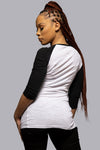 "Slim-fit top with a classic crew neck and straight hem for a sophisticated look."