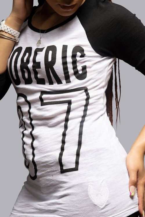 "Slim-fit top with a classic crew neck and straight hem for a sophisticated look."