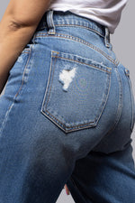 "Relaxed-fit boyfriend jeans with a casual, laid-back style."