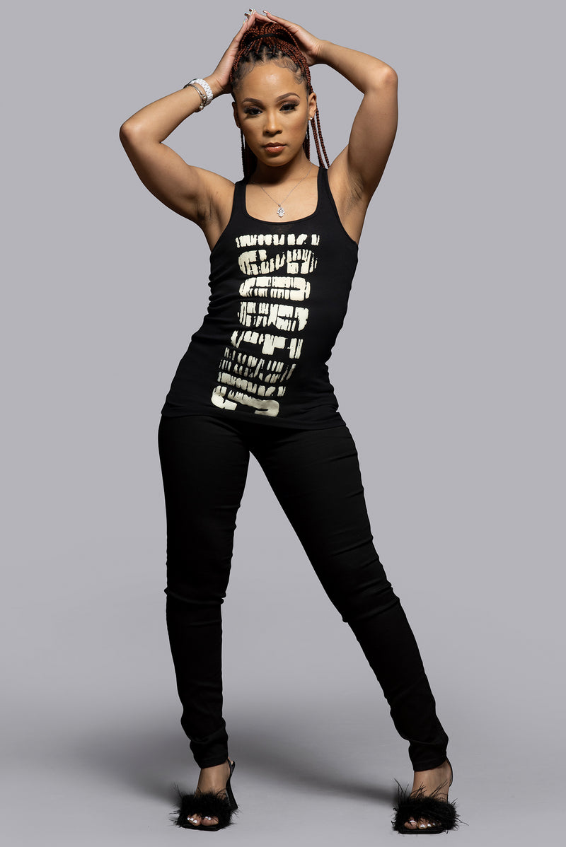 "Women's tank top with a regular fit, ultra-soft ribbed cotton, scoop neck, and sleeveless design—versatile for layering or wearing solo."